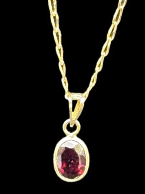 Pendentif or jaune grenat ovale