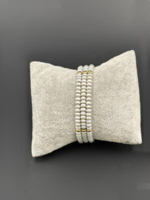 Bracelet perles de culture trois rangs et or jaune