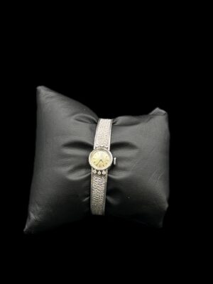 Montre bijoux or blanc 18 ct mécanique sertie de six diamants