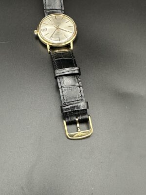 Montre Longines or jaune automatique bracelet cuir