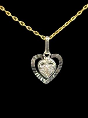 Pendentif coeur or gris 18 ct serti de trois diamants